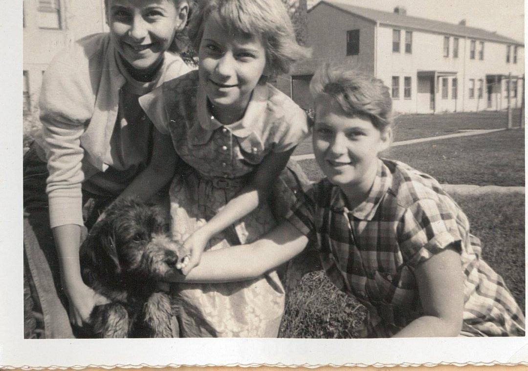 Early throwback Thursday.  My sisters and I with our "adopted" dog, Scotty in Lacey Park.