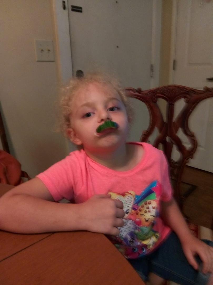 My girl! Snacking on cucumbers...
