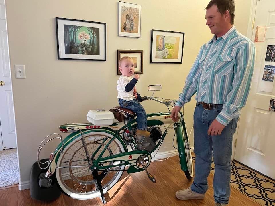 My great grandson on my Whizzer Motorbike
