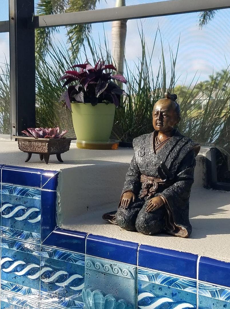 Relaxing in. our pool to cool off. It's very tranquil.