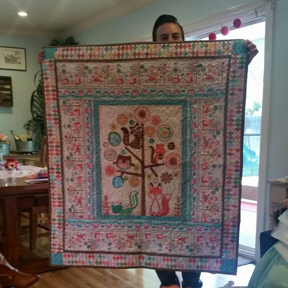 Baby quilt for. Quillen baby. Daddy Matt holding...