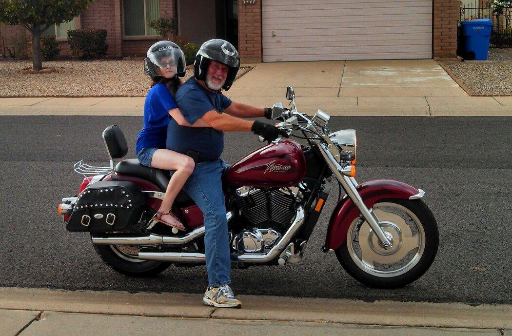 Katerina enjoying a ride with uncle Fred