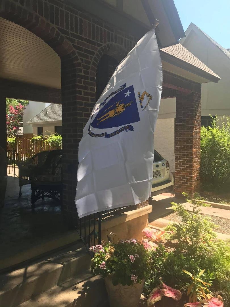 Ok peeps
whos flag is flying on my flag pole and why is it on there today?