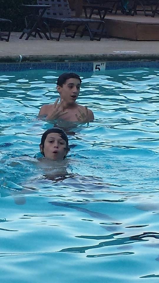 The Ryans swimming in our pool sat night will is in with them
