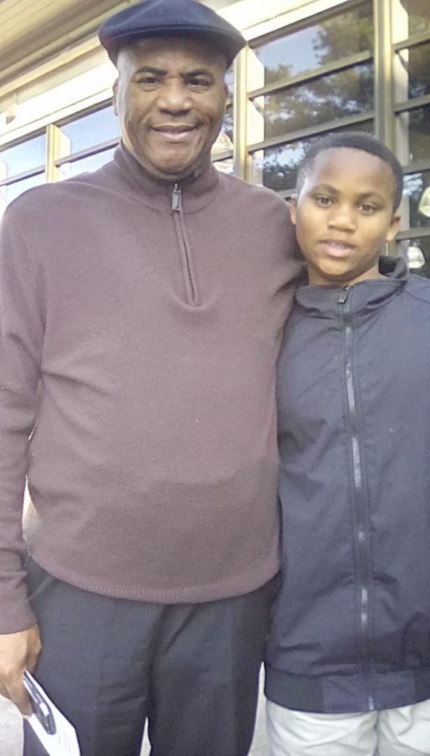 This is Gregory Sr. and Gregory jr. We all went to Aaliyah ceremony to honor the kids on honor role.