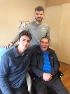 Great grandchildren Adam and Henry visiting with Bill Aird.