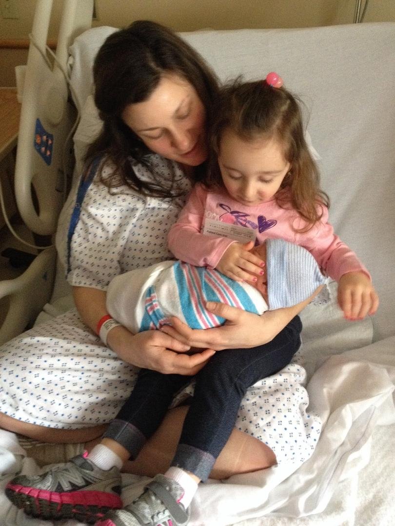 Giada's enjoying her first visit with her new baby brother. Our wonderful new grandson Nico, born yesterday.