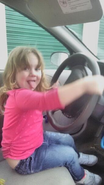 Look out everyone... Future young driver practicing in my car(in park of course,)