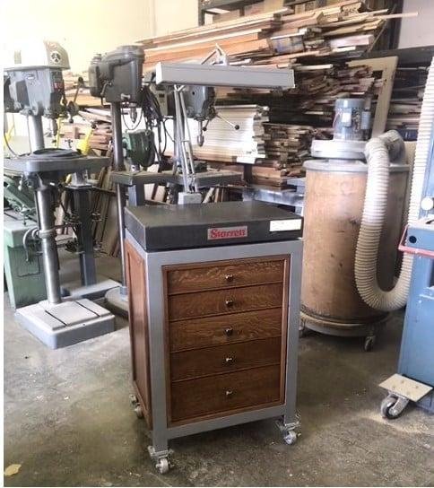 Trying to find space for additional tools storage. I put this together out of scrap white oak under one of the surface plates in the shop it works quite well.