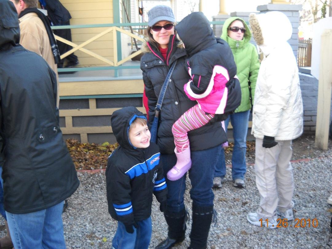 Kim and kids at Christmas Story house waiting in line on a bitter cold morning.