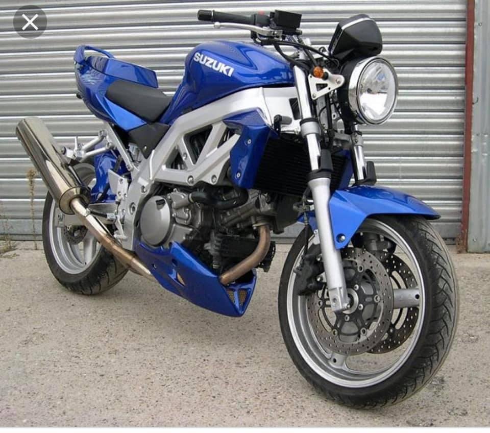Photos coming soon. Blue 2001 Suzuki SV650 motorcycle. Comes with one set of spare tires and rims, battery tender and matching HJC-18 helmets with clear and tinted visors. $2500 obo (stock photo)
