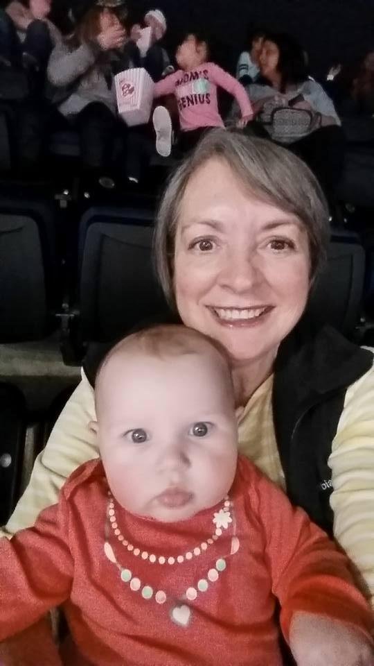 Selfie with Alyssa at the circus. She slept through the second half, even when the rocket man was shot out of the cannon!