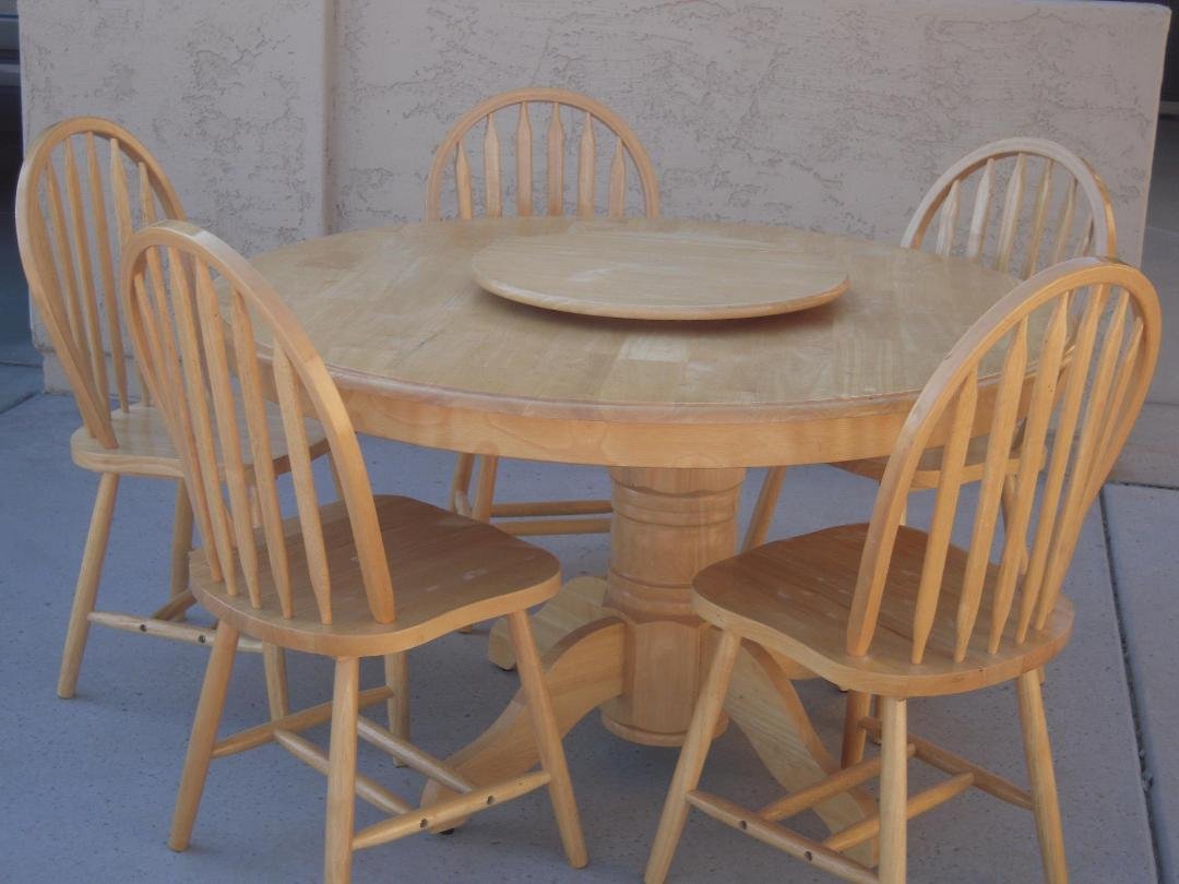 FOR SALE: Round table that seats up to six, includes 5 chairs and lazy susan for $100