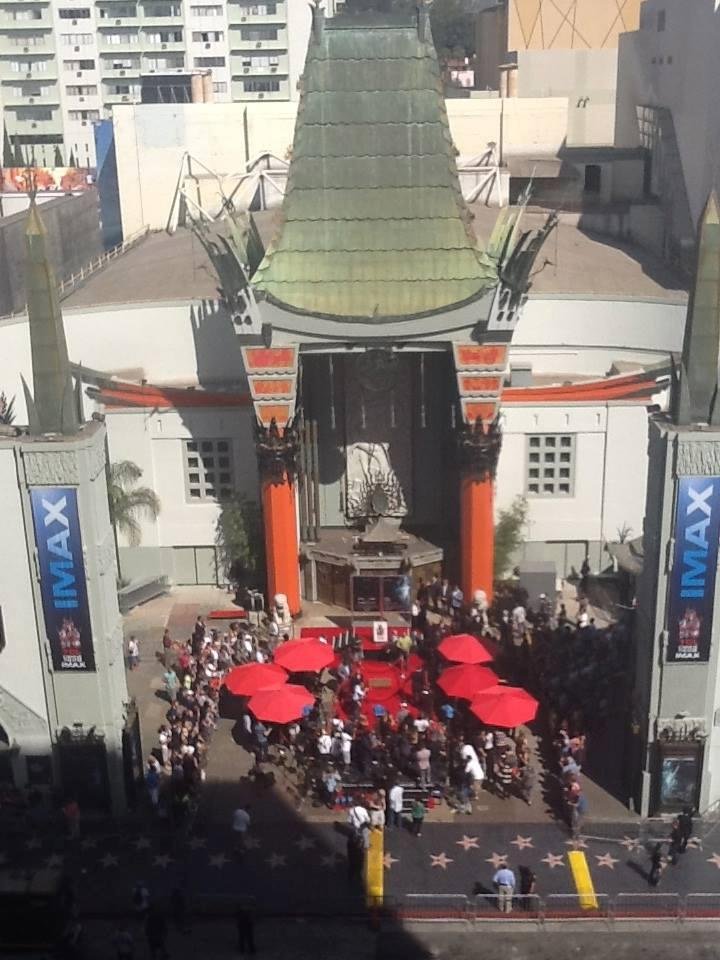 Sandra Bullock was having her hand and footprints cast in cement at the Chinese Theater today.