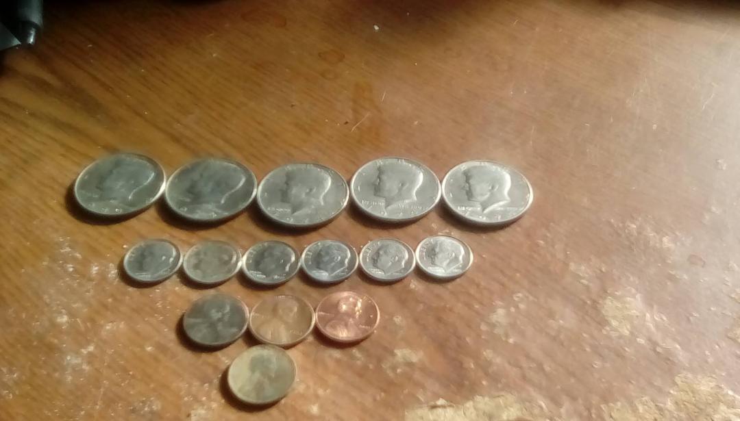 Wife and I on a hunt...she skunked me with 5 fifty cent pieces, 6 dime, 3 pennies and a 1935 wheat penny.