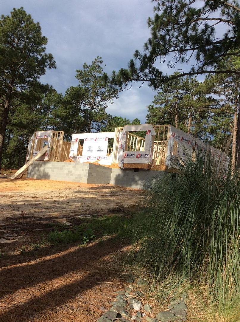 These  guys work fast. This is yesterday's progress. While they hammer today, we'll be signing the final papers for Belle Meade!