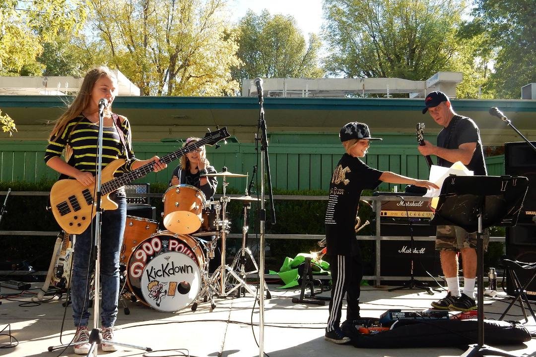 The versatile performing Baker family:  they all sing and play multiple instruments.  the audience LOVES them! gorgeous Sunday afternoon ... with dad managing.