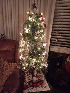 My new little tree. All the ornaments are Royal Doulton pattern "Old Country Rose" like my china pattern