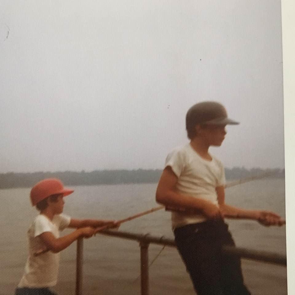Dan and I fishing in Wisconsin circa 1973 or '74. Of course, no fishing ensemble is complete without a plastic MLB batting helmet and a bamboo pole. Wiffle ball in the huge backyard, water skiing behind a pontoon boat and