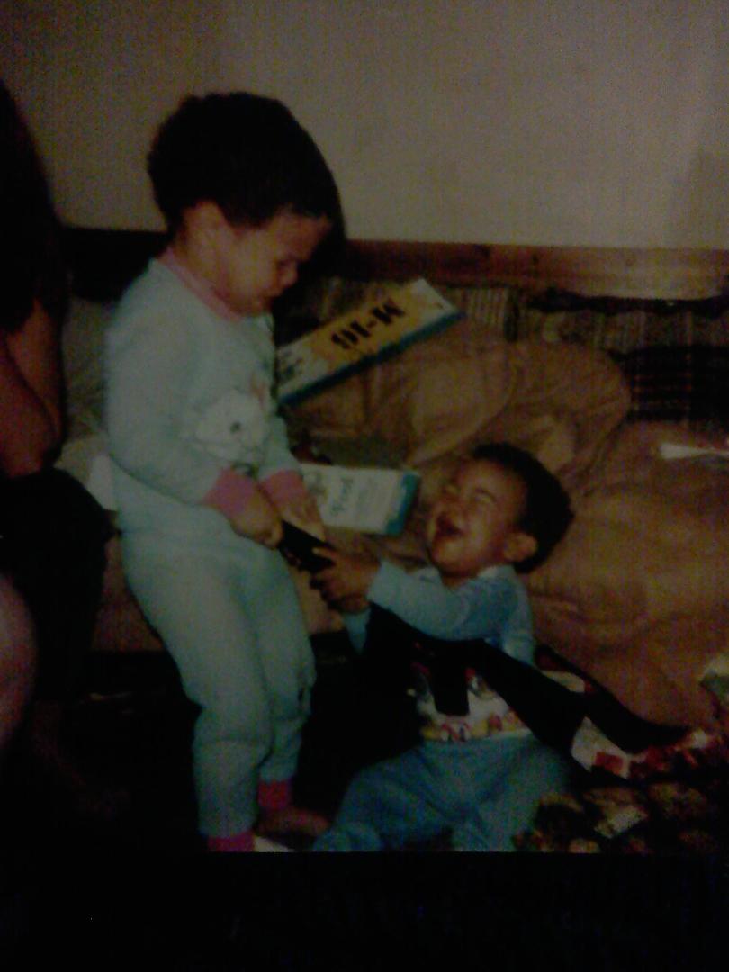 me and cuz main fighting over a toy gun at young ages lmao