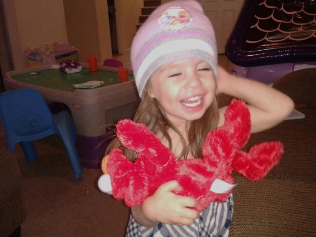 Addison with her new Elmo lol I knew she would like him