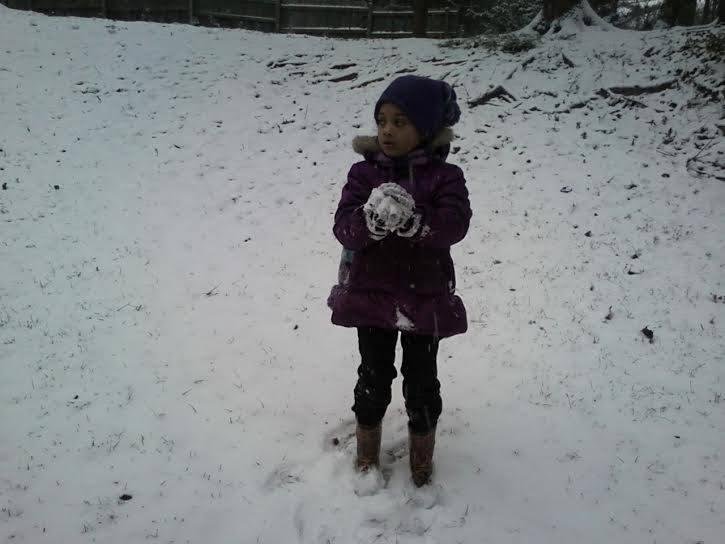 R J enjoying the rare snowfall in Georgia