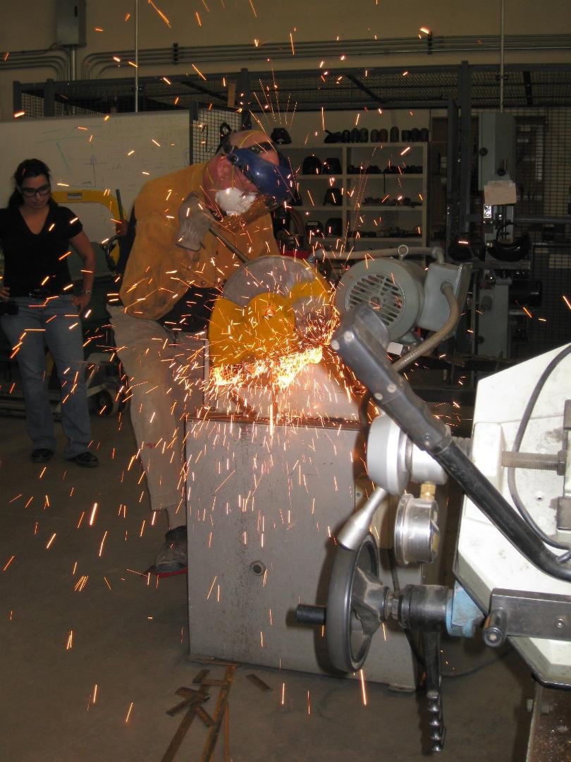 Cutting 'mild' steel 'coupons'.