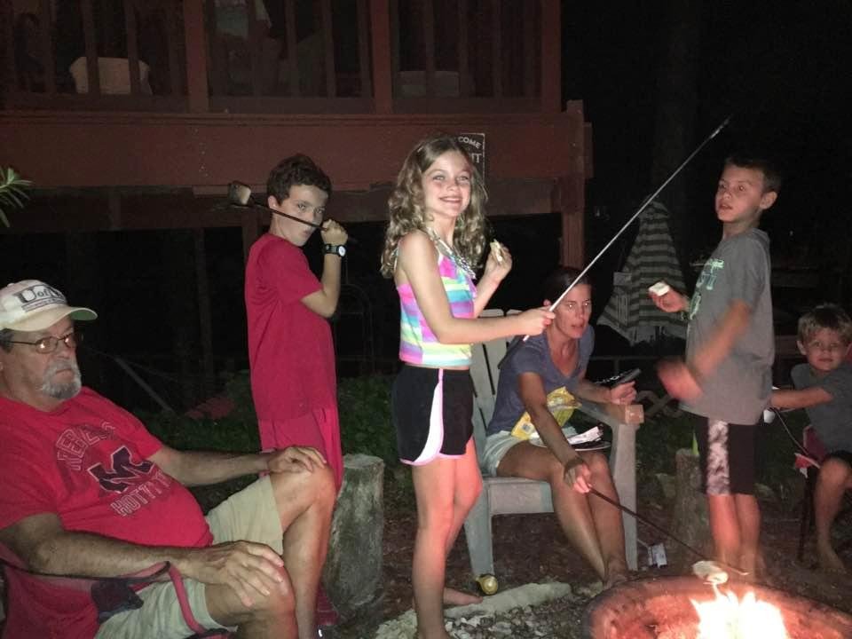 Making s'mores around the fire pit at Snow Lake!