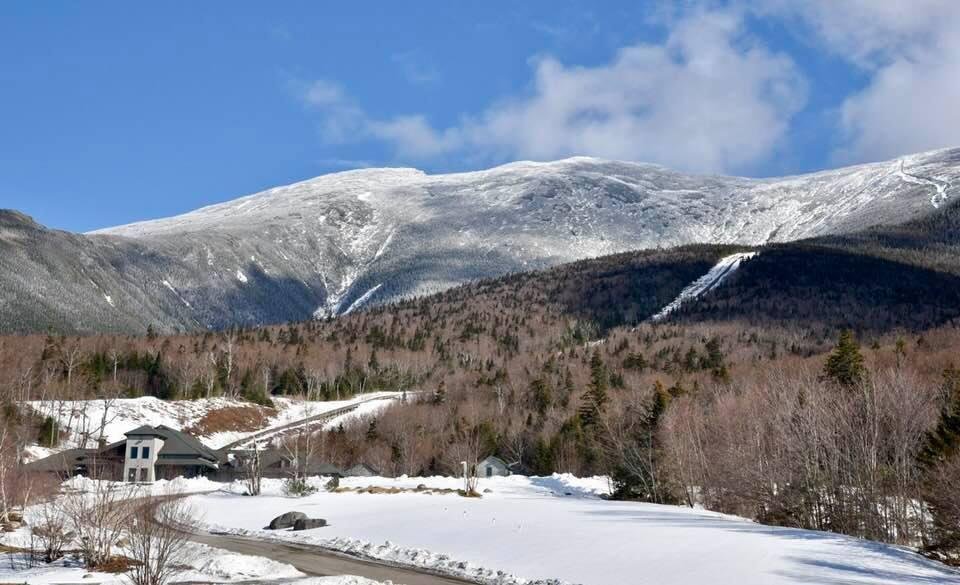 This is what the Mt Washington cog train looks like in the winter. We drove up to it through an icy and snowy back road. It was closed but the winter, of course, but there were people working on the rails.