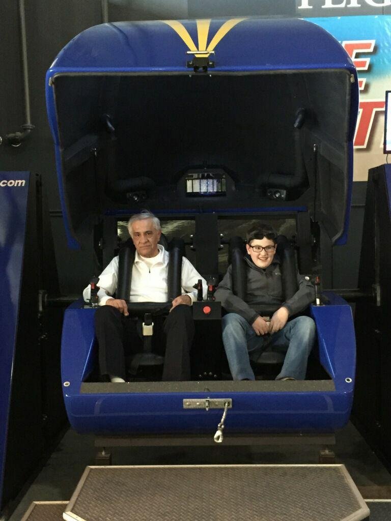 End of flight simulator with my grandson. I was not on the controls.