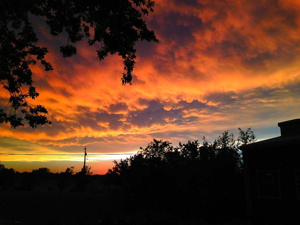 Chrissy took this pic out our backyard in Sanger, toward the west, as the storms that brought the tornados, finally began to clear!