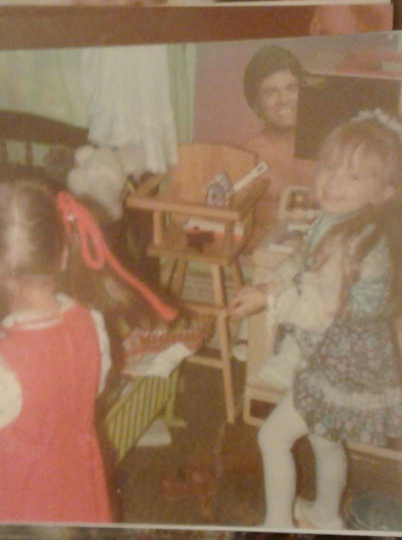 Playing in Candy's room. Note Eric Estrada on her wall. She loved watching chips