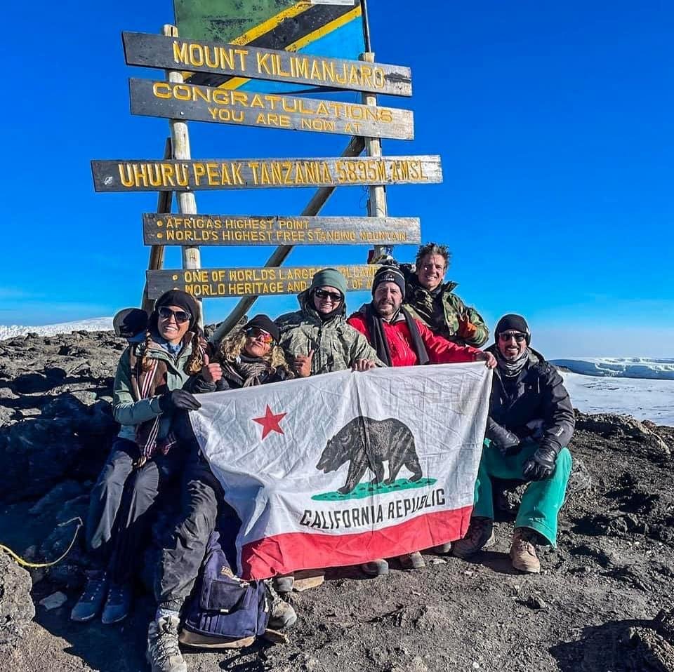 Well, Jonathan (L-R Jonathan is the 5th person over & no hat) you did it again climb Mt. Kilimanjaro, Tanzania, 19K+ high, with 5 of your friends. Proud of all of you. Now it's on to your Safari at Tarangire National Park