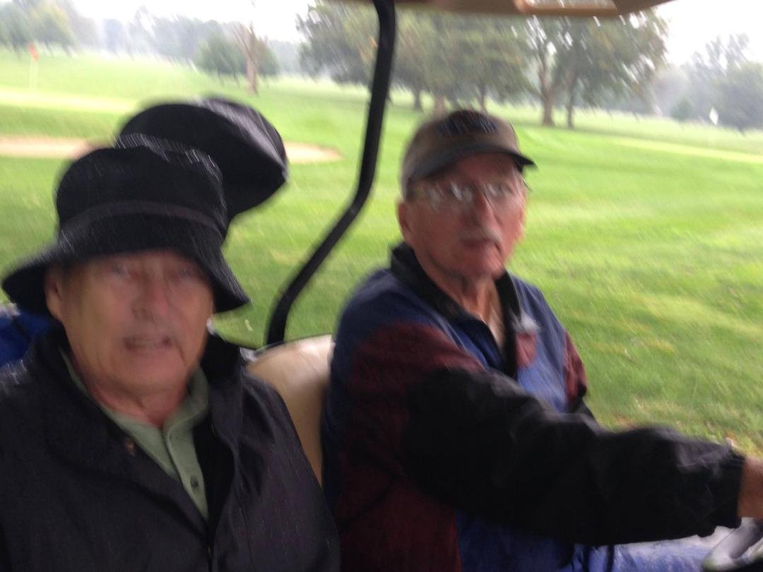 The Morgan brothers played golf in the rain, CAN YOU BELIEVE IT!!!!
Younger brother not real happy. Ha ha!