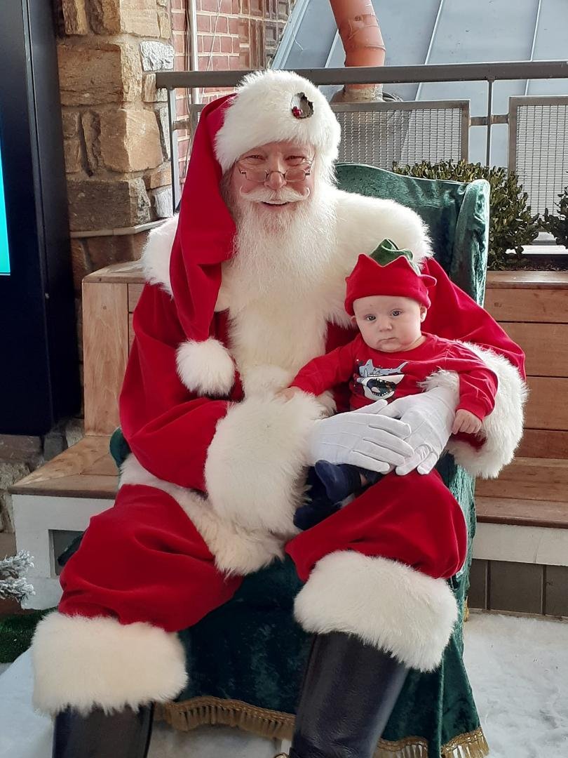 One of my favorite pics from this past weekend. He was very content sitting with Santa.