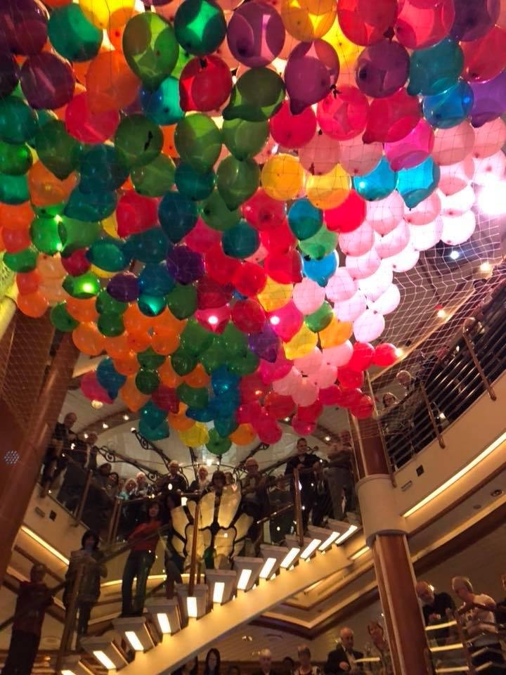 Dinner with Reed Royo, our favorite bartender onboard! Plus balloon drop party in the Piazza.