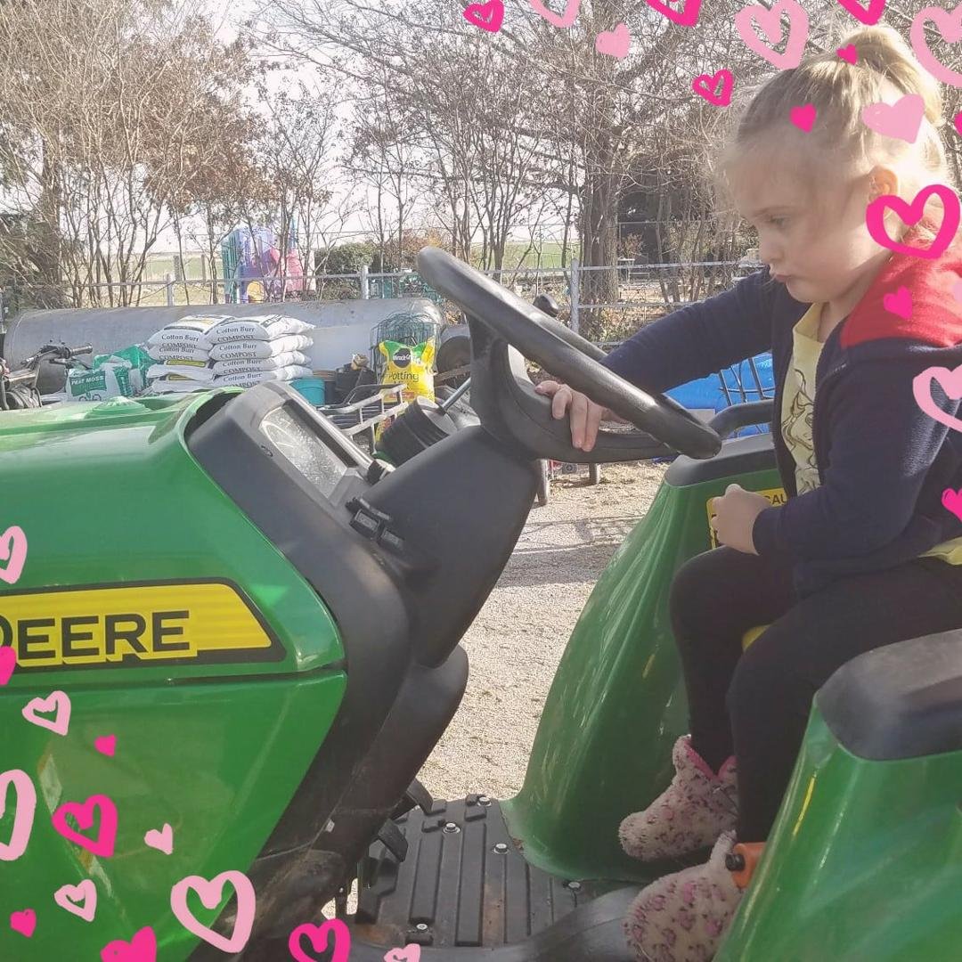 Layla working the tractor