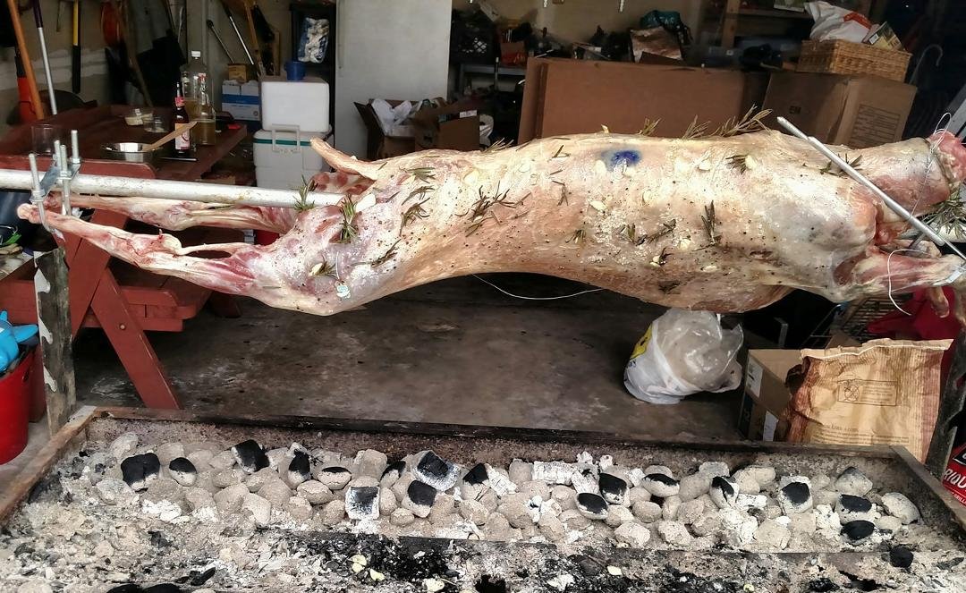 Easter Dinner, family, lamb on a spit.