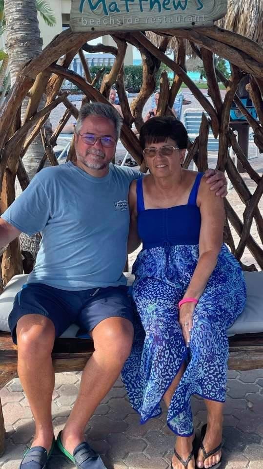 The only time I am allowed to hug my wife (in Aruba).