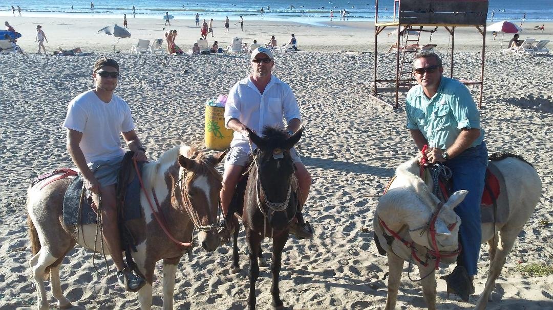 Horseback riding on the beach in Costa Rica.