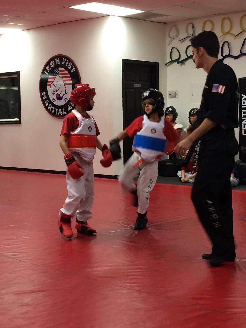 Alex sparing & then getting a new belt.... Orange with Black