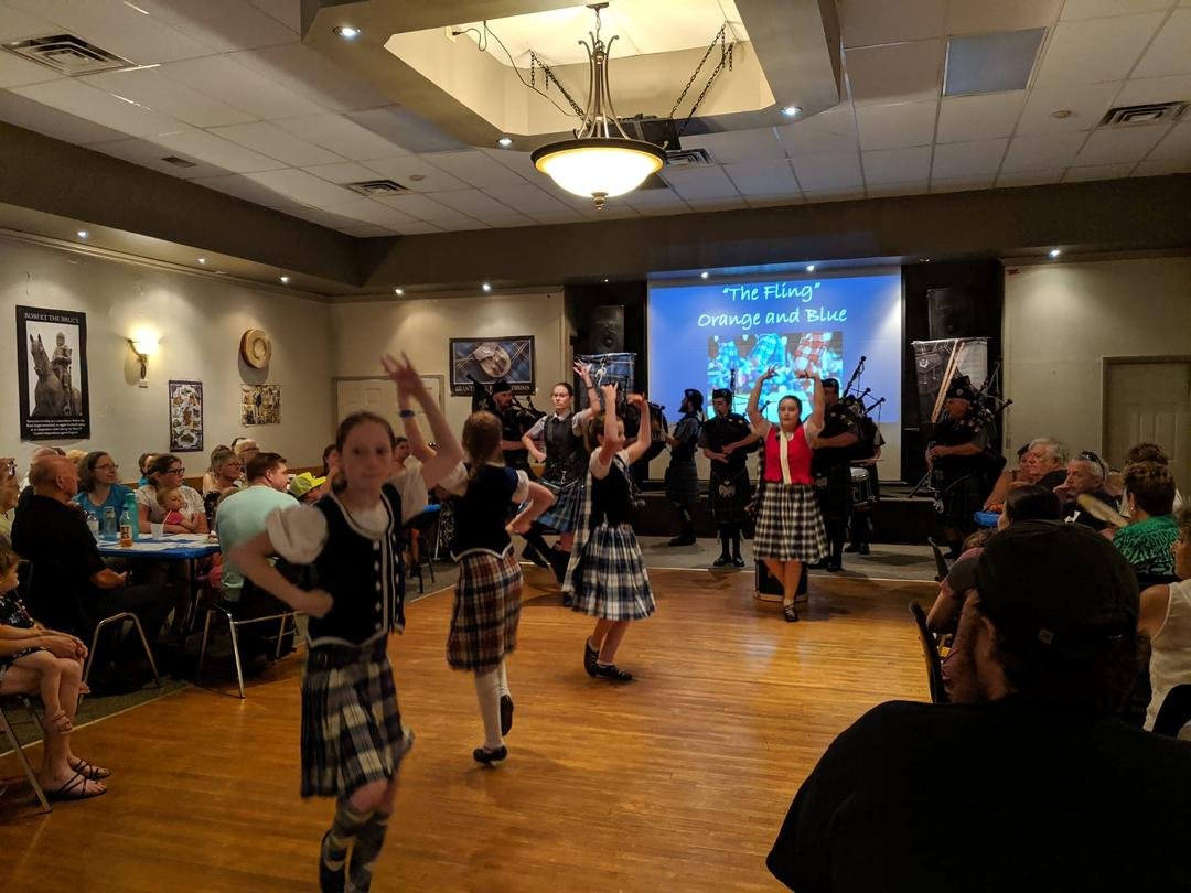 And the Scottish village entertainment begins