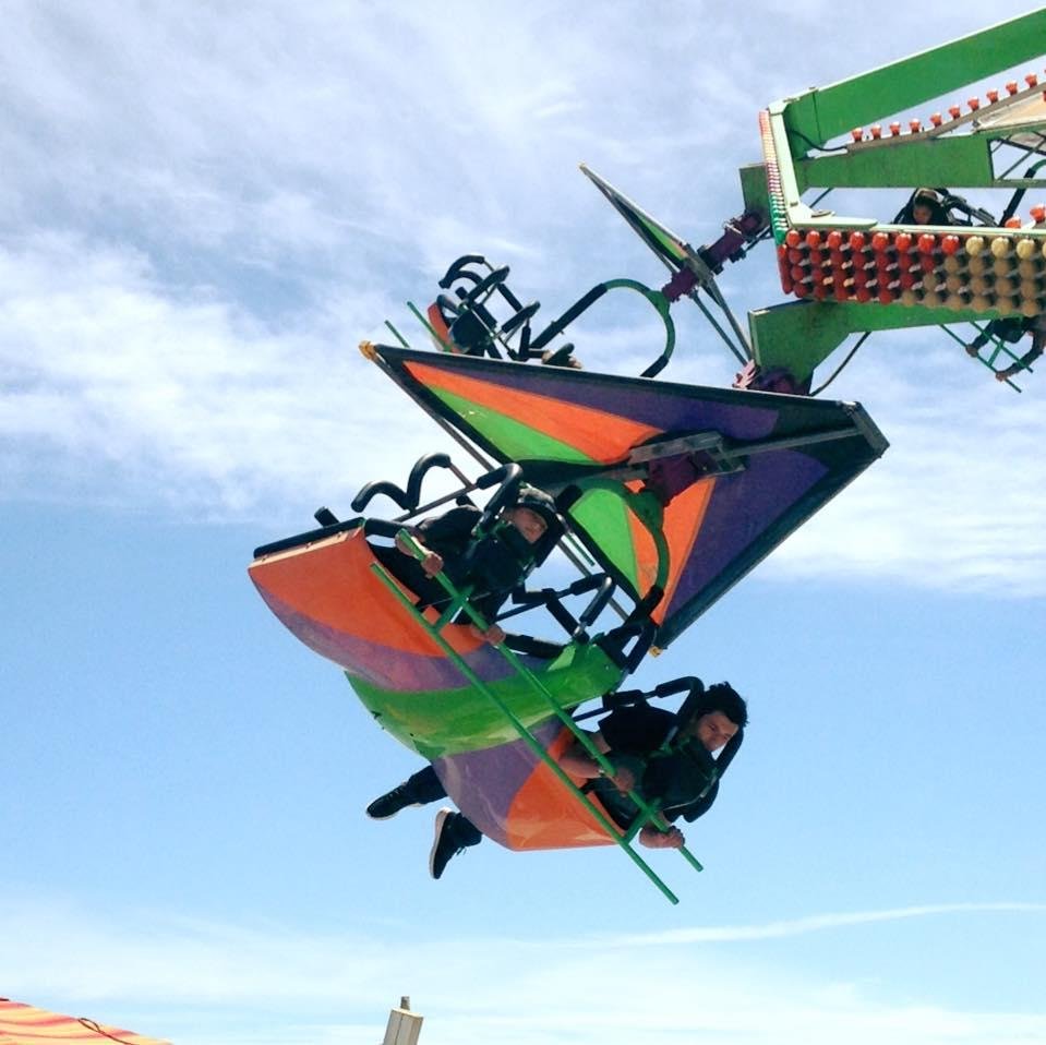 Michael and Daniel hang gliding at the Boardwalk in Santa Cruz.