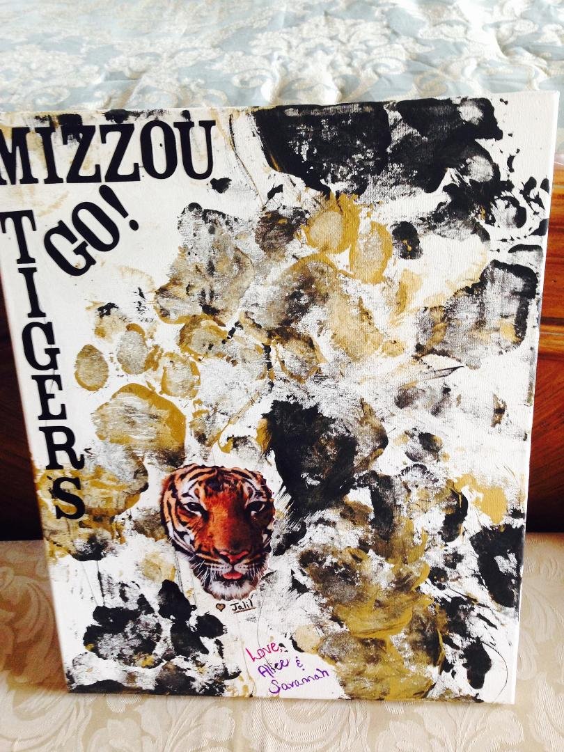 My birthday present from Alice and Savannah my own paw painted picture from a real Mizzou tiger thanks Jalil