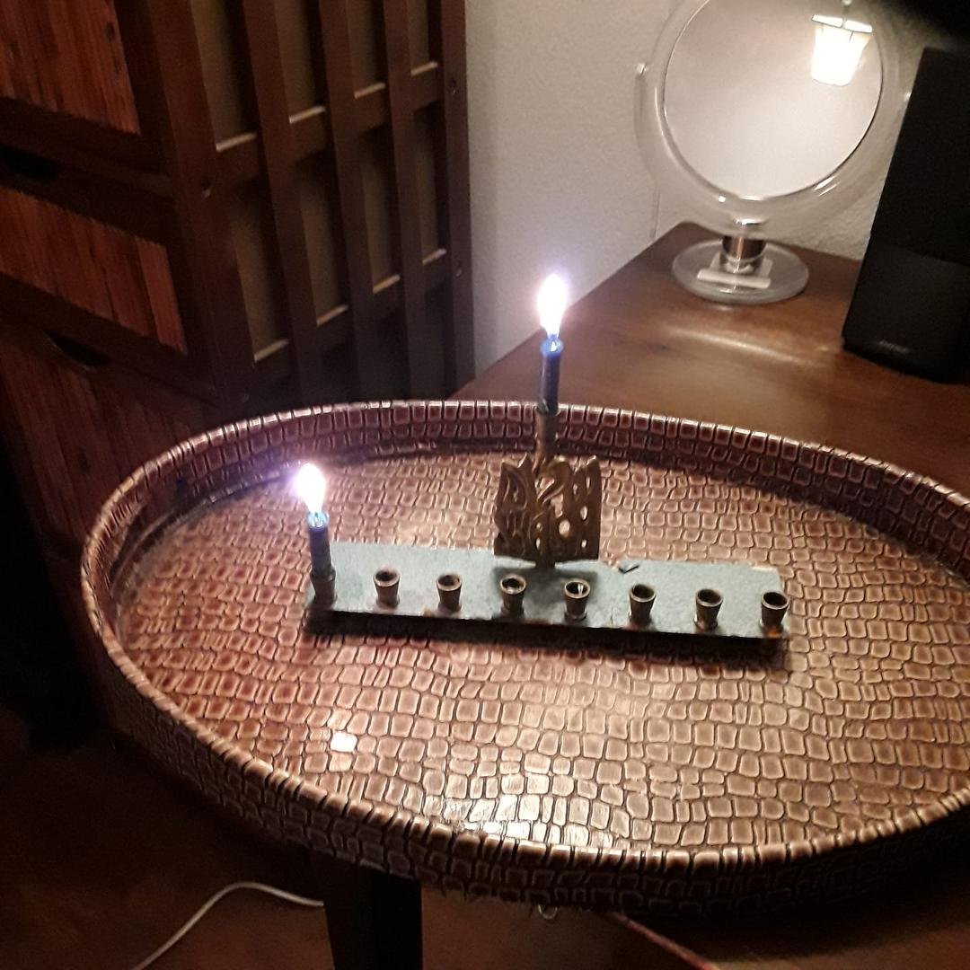 I'm excited that I lit my first Hanukkah candle tonight! Happy Hanukkah everybody! Hanukkah means that things will get brighter and brighter! Thanks to Richard Tanner for the beautiful candles that were much longer  earlier