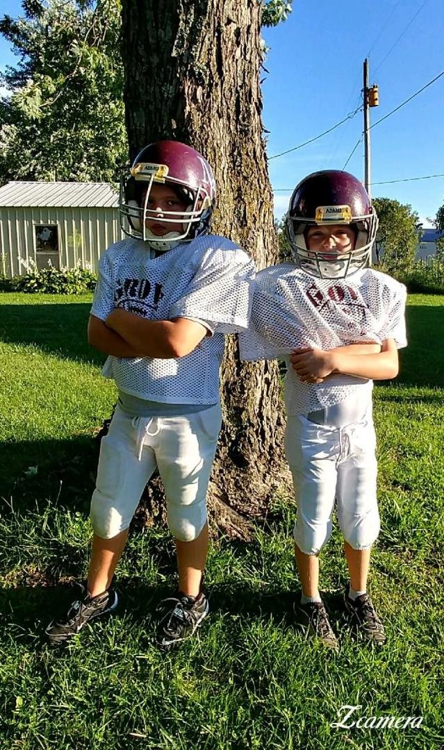My two youngest grandsons!! Eli 9 and Brady 8!! They're ready for football season to begin and me too!! Love them so....... much!!
