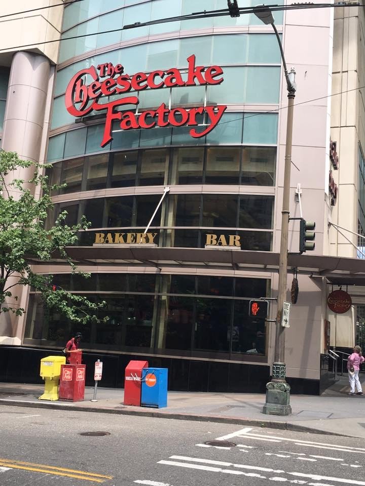 Pigging out with Linda, Linda , and Bob! Just finished lunch and are perusing the CHEESECAKE MENU!