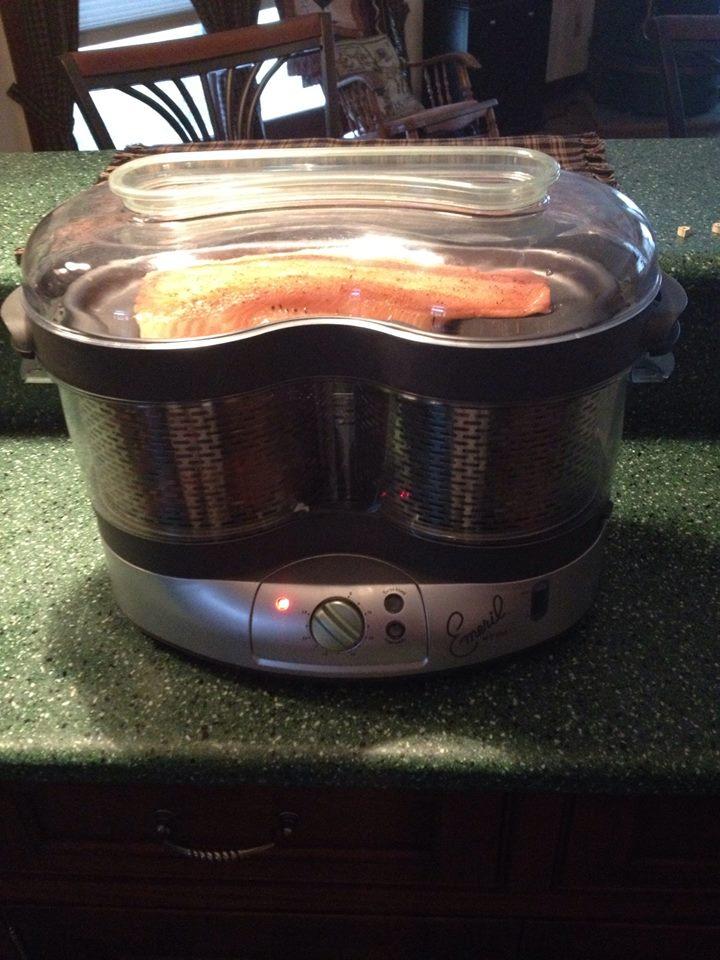 Eating healthy with my Emeril Steamer. Steamed salmon carrots broccoli and cauliflower. Yum