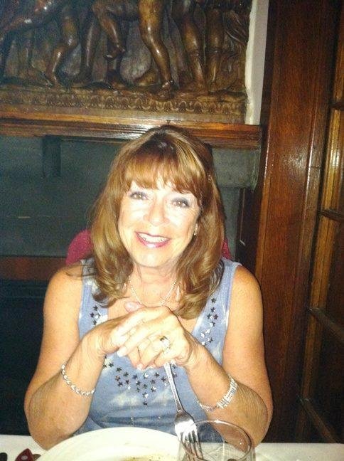 Why is she smiling. Because she has me for a husband and our 18th wedding anniversary was spent at the Hawthorne restaurant in Warwick, NY. Our 1st date place.....