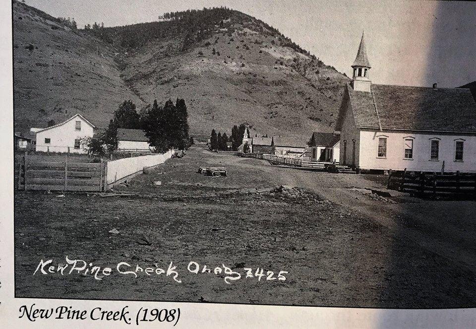Meredith Wade house on left, on right first church is Baptist, church farthest away is Methodist, in New Pine Creek, Oregon on Church Street.